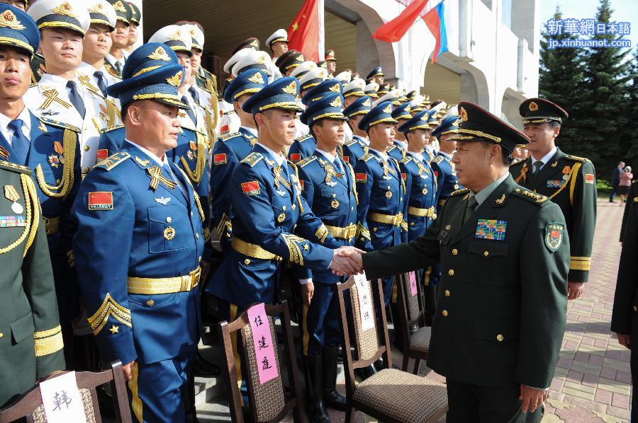 （XHDW）（1）范长龙看望参加俄罗斯纪念卫国战争胜利70周年庆典的我军阅兵方队官兵