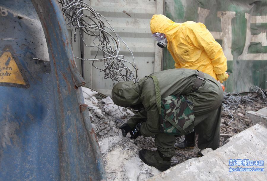 （天津港“8·12”事故）（3）救援部队分组进入核心区对危化品辨识标记清理货物