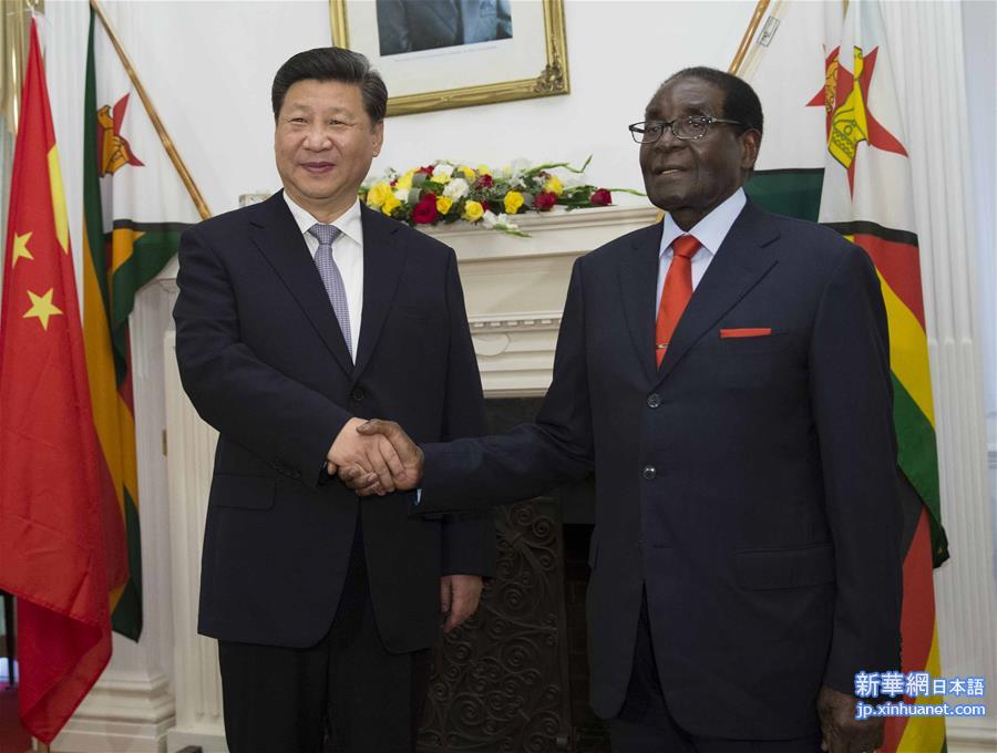（时政）习近平同津巴布韦总统穆加贝举行会谈