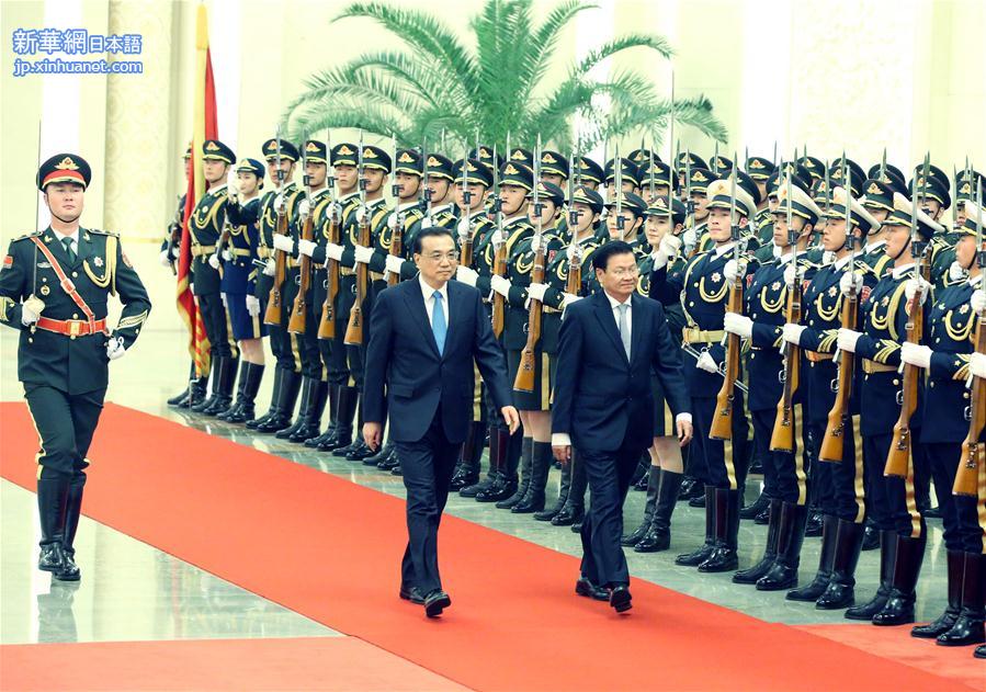 （时政）李克强同老挝总理通伦举行会谈