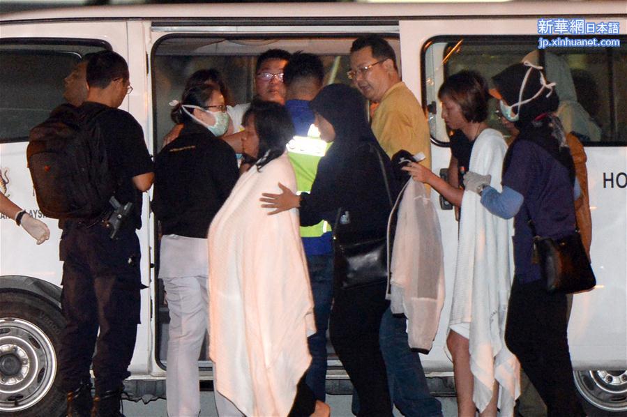 （国际）（7）马来西亚沙巴州沉船事件获救中国游客抵达哥打基纳巴卢 