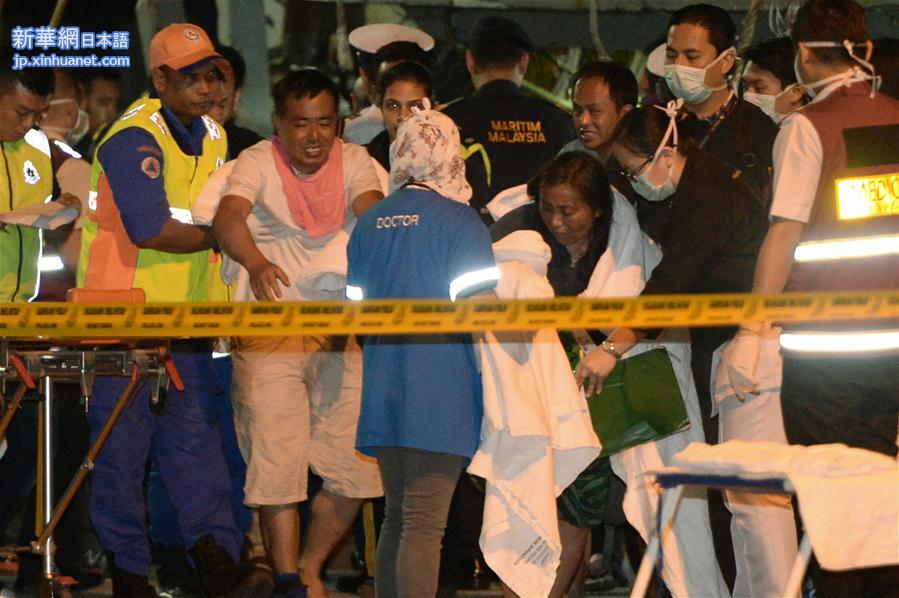 （国际）（5）马来西亚沙巴州沉船事件获救中国游客抵达哥打基纳巴卢 