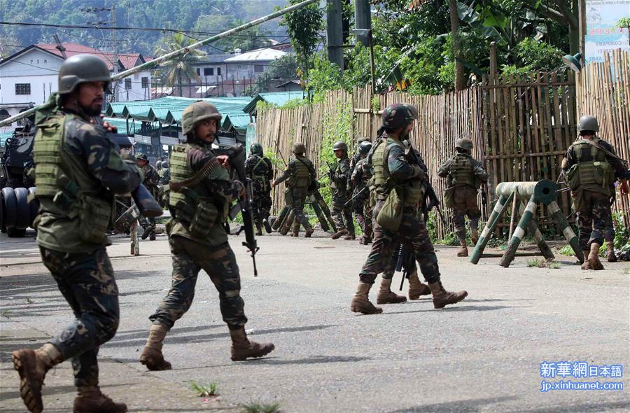 （国际）（1）菲军警与“穆特组织”继续交战
