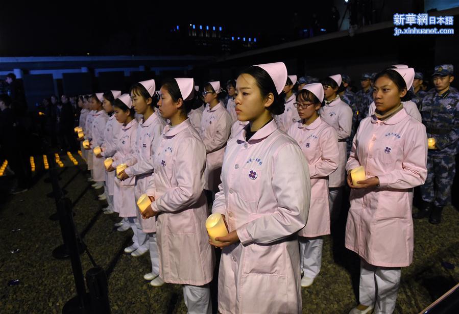 （社会）（3）南京：“烛光祭”寄托哀思祈愿和平