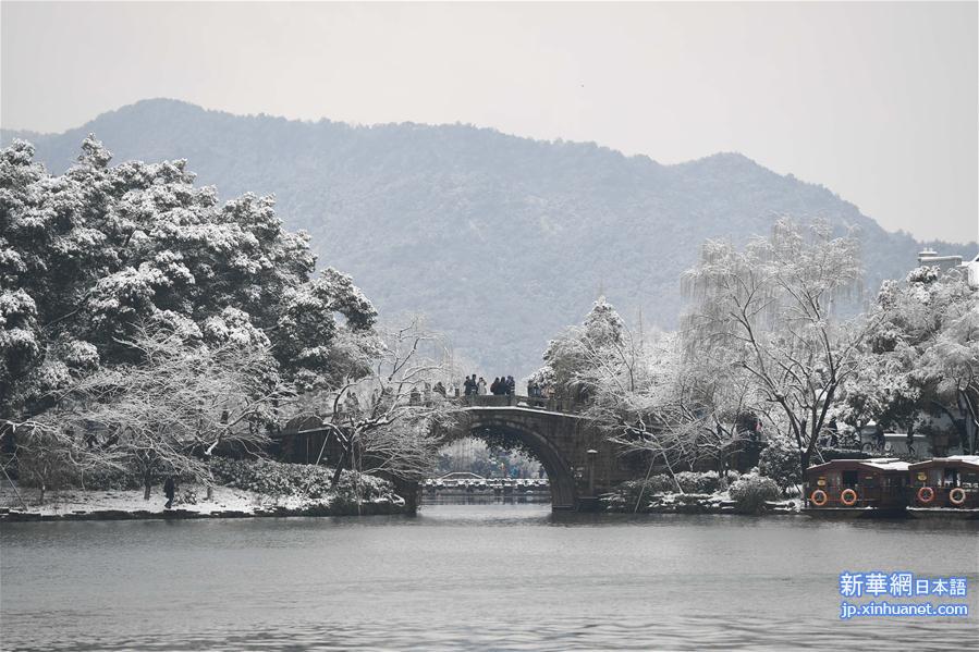 （社会）（3）雪韵西湖引客来