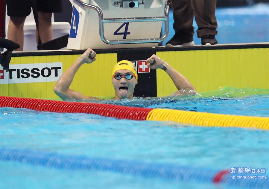 （亚运会）（2）游泳——男子100米仰泳：中国选手徐嘉余夺冠