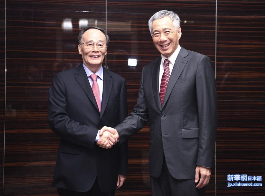 （时政）王岐山会见新加坡总理李显龙