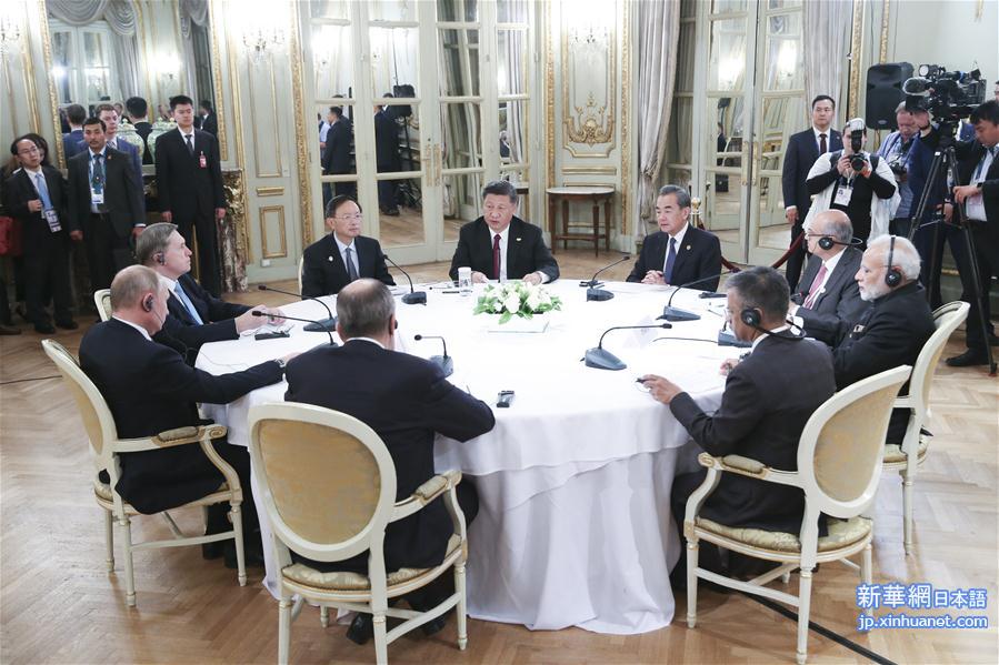 （时政）习近平出席中俄印领导人非正式会晤