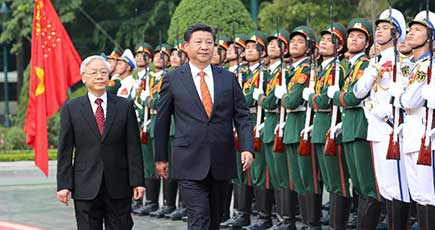 習近平総書記はベトナム共産党のグエン・フー・チョン書記長が行った歓迎の儀式に出席