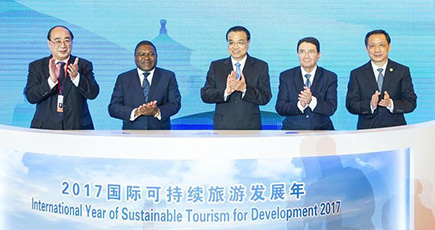 李克強総理、第一回世界観光発展大会の開幕式に出席し、挨拶する